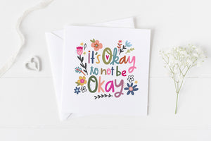 5x5 greeting card by Eliza Todd with flowers saying "It's okay to not be okay." - APeaceofWerk.com